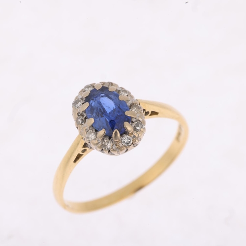 1452 - An 18ct gold sapphire and diamond oval cluster ring, platinum-topped with oval mixed-cut sapphire an... 