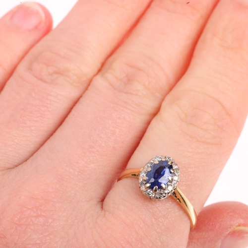 1452 - An 18ct gold sapphire and diamond oval cluster ring, platinum-topped with oval mixed-cut sapphire an... 