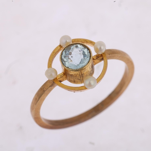 1456 - An Edwardian blue topaz and pearl openwork ring, apparently unmarked, setting height 11.2mm, size K,... 