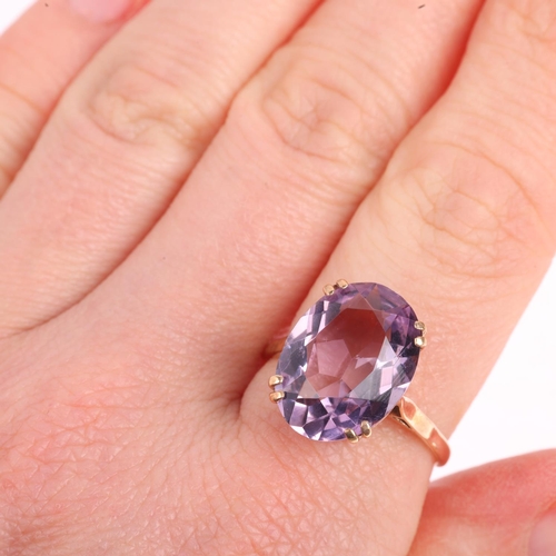 1462 - A mid-20th century 9ct gold amethyst dress ring, maker A&Co, London 1963, set with oval mixed-cut am... 