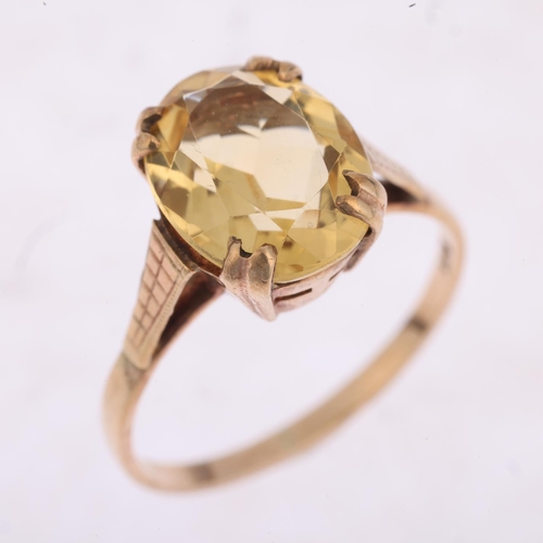 1463 - A mid-20th century 9ct gold citrine dress ring, set with oval mixed-cut citrine, setting height 11.1... 