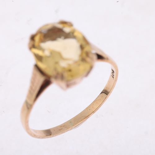 1463 - A mid-20th century 9ct gold citrine dress ring, set with oval mixed-cut citrine, setting height 11.1... 