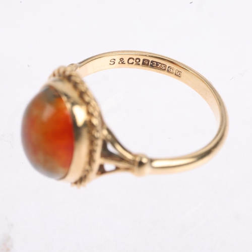 1466 - A 1970s 9ct gold moss agate dress ring, maker S&Co, Birmingham 1972, set with oval cabochon agate, s... 