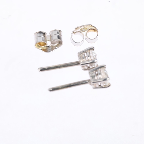 1471 - A pair of 0.32ct solitaire diamond earrings, with stud fittings, apparently unmarked settings test a... 