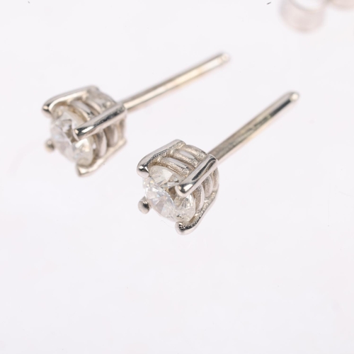 1471 - A pair of 0.32ct solitaire diamond earrings, with stud fittings, apparently unmarked settings test a... 