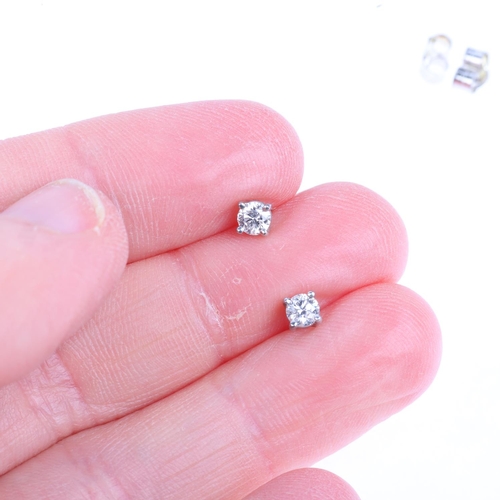 1471 - A pair of 0.32ct solitaire diamond earrings, with stud fittings, apparently unmarked settings test a... 