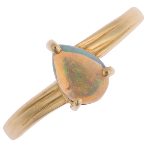 1477 - A modern 14ct gold solitaire opal ring, claw set with pear cabochon opal, opal measures approx 6.84 ... 