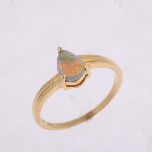 1477 - A modern 14ct gold solitaire opal ring, claw set with pear cabochon opal, opal measures approx 6.84 ... 