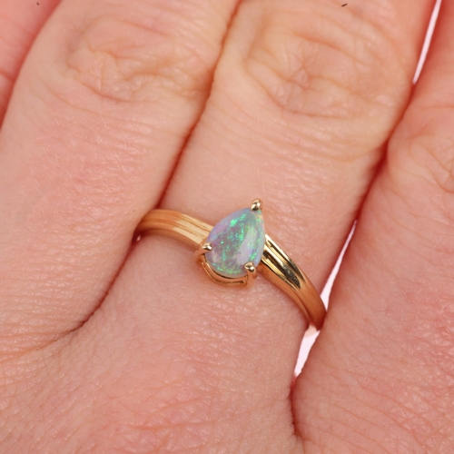 1477 - A modern 14ct gold solitaire opal ring, claw set with pear cabochon opal, opal measures approx 6.84 ... 