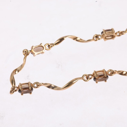 1481 - A 9ct gold smoky quartz tennis line bracelet, 18cm, 3.5g