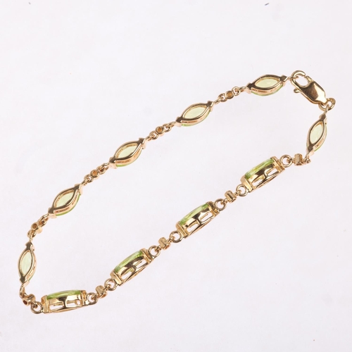 1485 - A 9ct gold peridot tennis line bracelet, set with marquise-cut peridot, 18cm, 6.2g