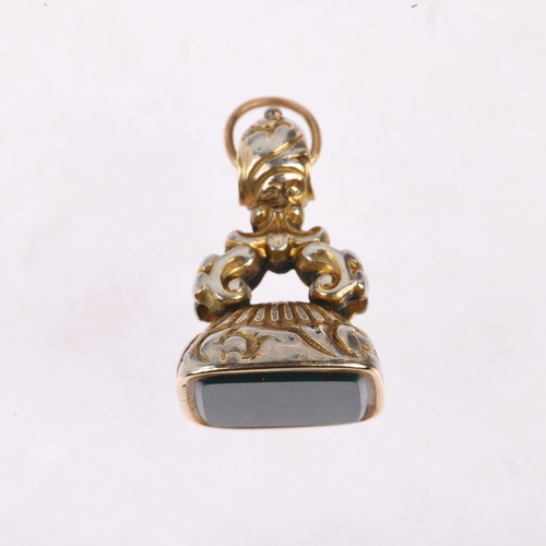 1490 - A Georgian bloodstone fob, gilt-metal foliate frame, panel measures 12.8 x 11.2mm, fob 24.2mm, 4.2g