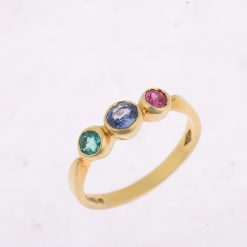 1498 - An 18ct gold three stone ruby sapphire and emerald dress ring, maker AJ, London 1992, setting height... 