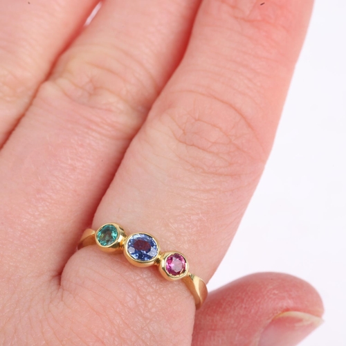 1498 - An 18ct gold three stone ruby sapphire and emerald dress ring, maker AJ, London 1992, setting height... 