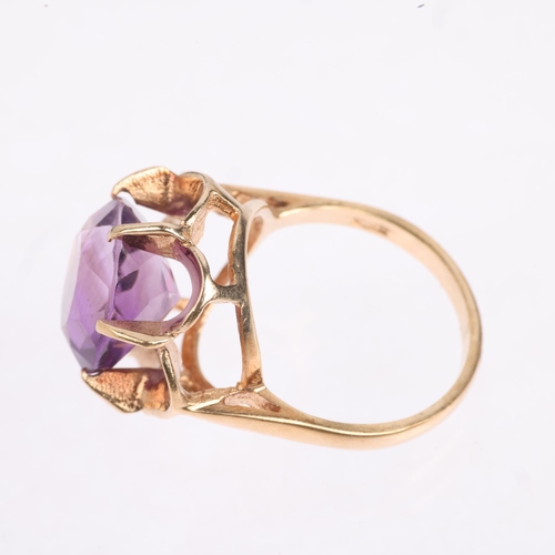 1504 - A late 20th century 9ct gold amethyst dress ring, setting height 17mm, size N, 4.9g