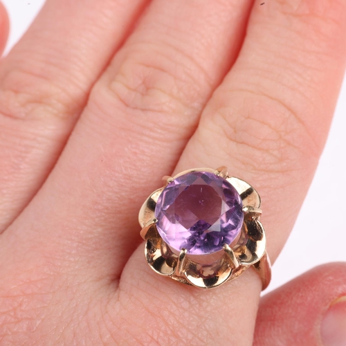 1504 - A late 20th century 9ct gold amethyst dress ring, setting height 17mm, size N, 4.9g