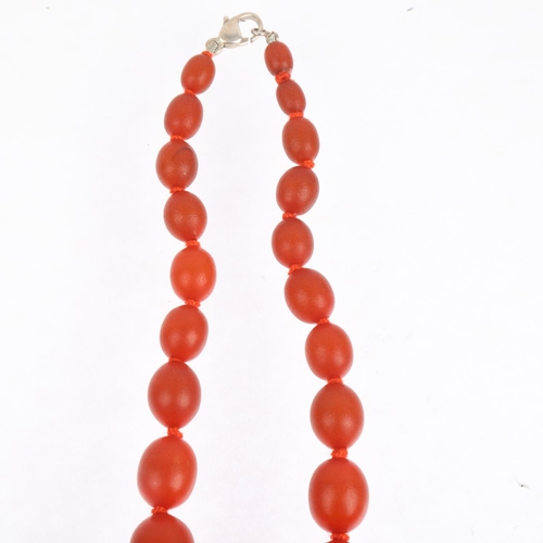 1528 - A single-strand graduated amber? bead necklace, beads measure: 24-8.6mm, 42cm, 47.5g