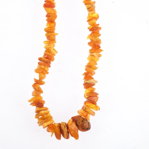 1530 - A single-strand Russian rough amber bead necklace, 66cm, 37.2g