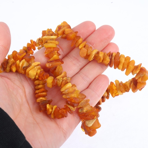 1530 - A single-strand Russian rough amber bead necklace, 66cm, 37.2g