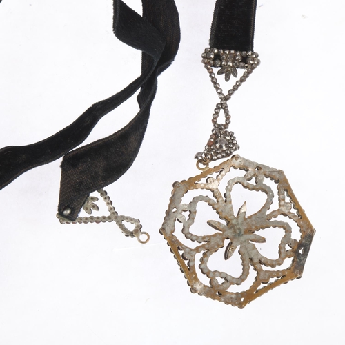 1556 - A Georgian cut-steel Tudor Rose pendant necklace, on black fabric cord, pendant 63mm, 60cm, 19.7g