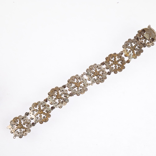 1559 - A Georgian cut-steel flowerhead panel bracelet, 18cm, 30.3g