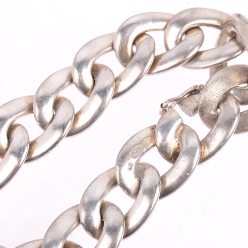 1567 - A heavy sterling silver cable link chain bracelet, textured and polished decoration, 19cm, 71.3g