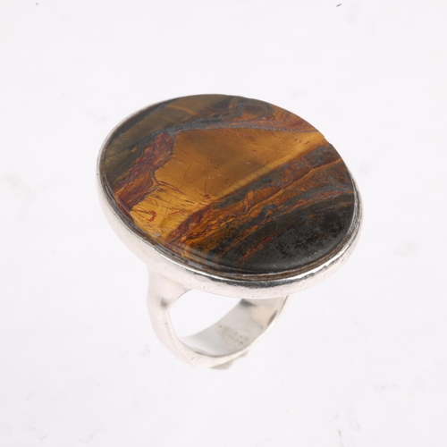 1568 - A large German sterling silver tigers eye dress ring, maker KH, setting height 30.5mm, size P, 18g