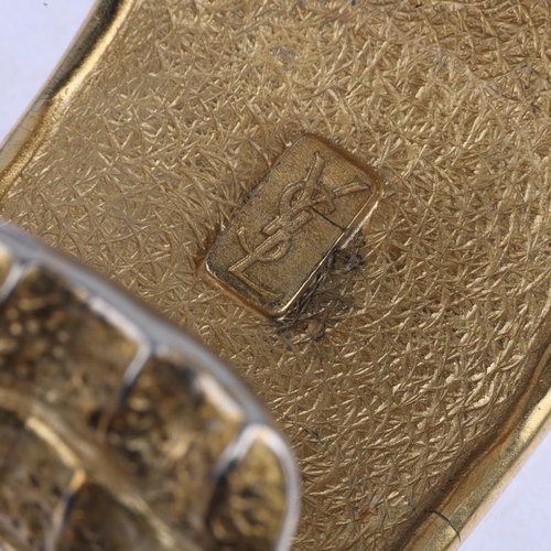 1581 - YVES SAINT LAURENT - a Vintage gilt-metal crocodile cuff bangle, signed YSL, setting height 46.7mm, ... 