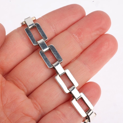 1585 - A Mexican sterling silver geometric panel bracelet, by Exign, 17.5cm, 22.2g