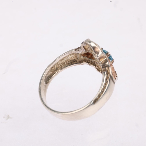 1586 - A sterling silver and 12k two-colour gold blue topaz 'Black Hills' leaf ring, setting height 19.5mm,... 