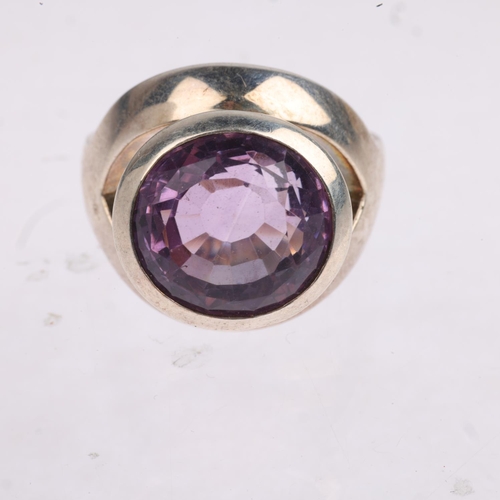 1591 - A sterling silver amethyst eye ring, setting height 19.2mm, size P, 18.2g