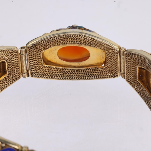 1593 - A Chinese silver-gilt carnelian and enamel panel bracelet, band width 19.5mm, internal circumference... 