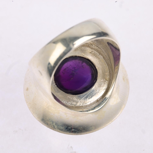 1604 - A sterling silver modernist amethyst abstract ring, setting height 25.5mm, size O, 14.6g