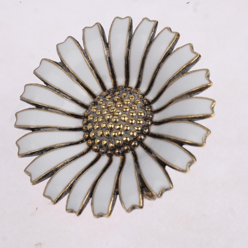 1627 - ANTON MICHELSEN - a a Danish modernist sterling silver-gilt white enamel daisy pattern brooch, 32.2m... 