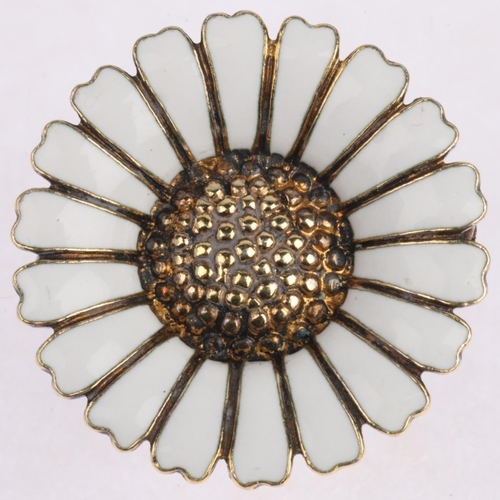 1628 - BERNHARD HERTZ - a a Danish modernist sterling silver-gilt white enamel daisy pattern brooch, 29.4mm... 