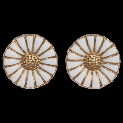 1629 - GEORG JENSEN - a pair of Danish modernist sterling silver-gilt white enamel daisy pattern earrings, ... 