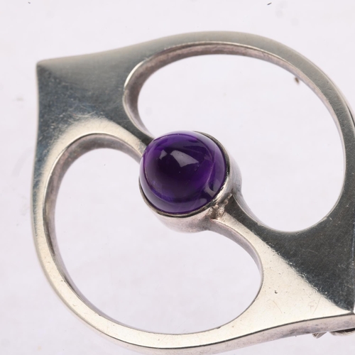 1640 - HANS HANSEN - a a Danish modernist sterling silver amethyst openwork eye brooch, 46.4mm, 13.3g