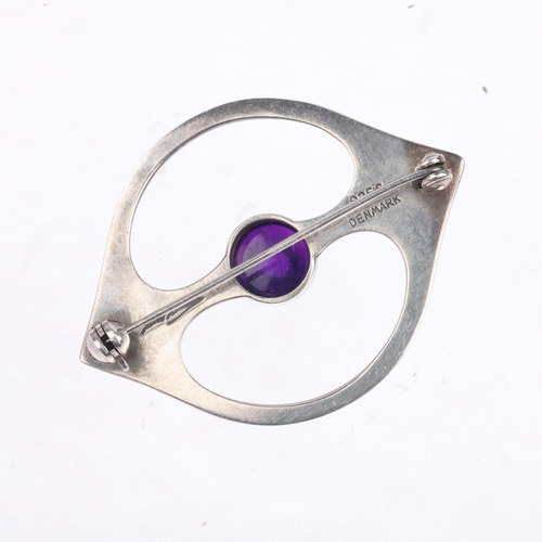 1640 - HANS HANSEN - a a Danish modernist sterling silver amethyst openwork eye brooch, 46.4mm, 13.3g