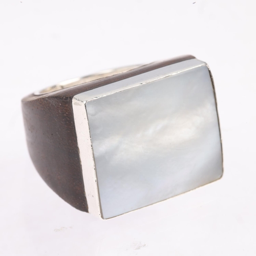 1643 - A large Danish sterling silver mother-of-pearl and hardwood signet ring, setting height 22mm, size S... 