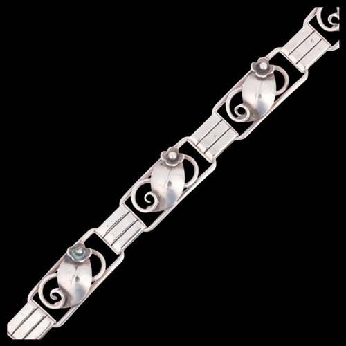 1656 - HANS JULIUS LARSEN - an Art Deco Danish silver floral openwork panel bracelet, 19cm, 23.8g