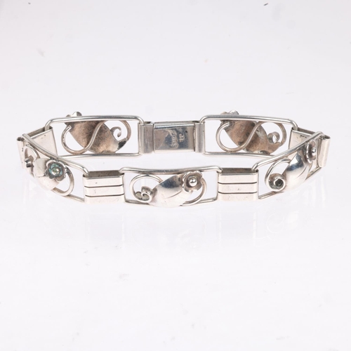 1656 - HANS JULIUS LARSEN - an Art Deco Danish silver floral openwork panel bracelet, 19cm, 23.8g