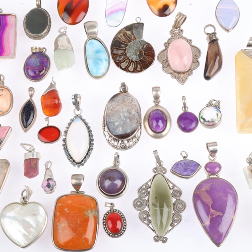 1674 - A quantity of silver gem set pendants, 302g gross