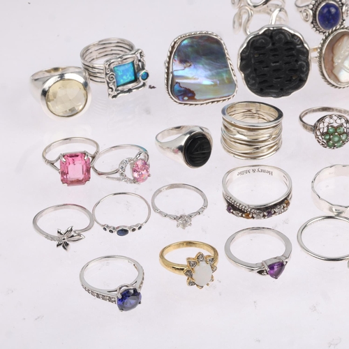 1698 - A quantity of silver gem set rings, 211g