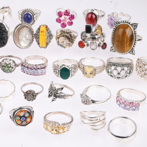 1698 - A quantity of silver gem set rings, 211g