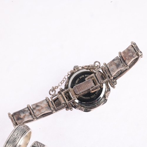 1699 - A group of silver jewellery, including wristwatch and 2 rings, 45g gross