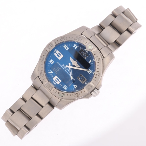 1004 - BREITLING - a titanium Aerospace EVO electronic digital wristwatch, ref. E79363, blue dial with Arab... 