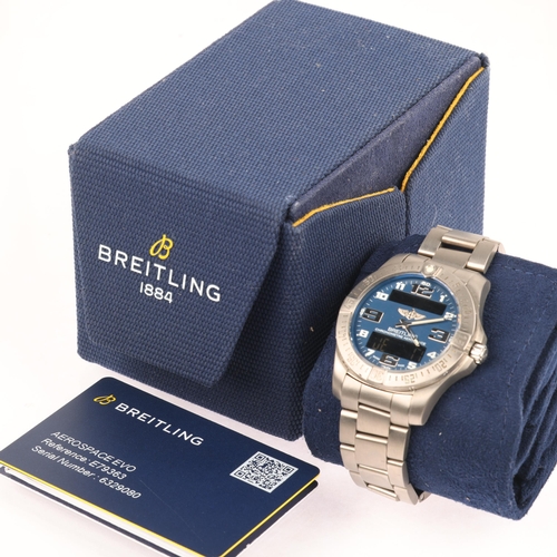 1004 - BREITLING - a titanium Aerospace EVO electronic digital wristwatch, ref. E79363, blue dial with Arab... 