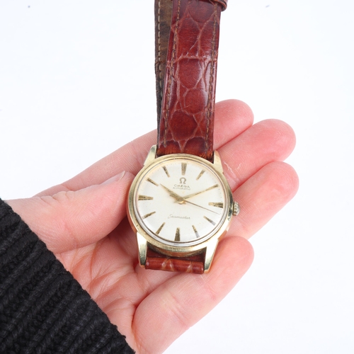 1016 - OMEGA - a Vintage gold plated stainless steel Seamaster automatic wristwatch, ref. 14704-3 SC, circa... 