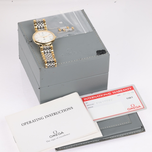 1020 - OMEGA - a gold plated stainless steel De Ville 'Meghraj Group' quartz calendar bracelet watch, ref. ... 