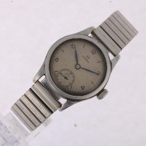 1022 - OMEGA - a Second World War Period stainless steel mechanical wristwatch, ref. 2165, circa 1939, silv... 